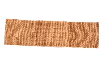 A single elastic adhesive bandage patch on a plain background