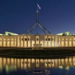 Parliament House in Canberra, Australia, illuminated at dusk