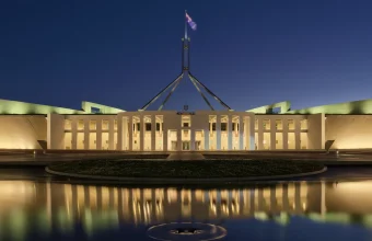 Parliament House in Canberra, Australia, illuminated at dusk