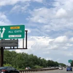 How to Build a Skip List in Python to Get Balanced-Tree Speed Without the Rotations A green highway sign splitting into an EXPRESS lane and a LOCAL lane, the same express-lane idea a skip list uses to skip ahead through sorted data
