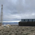Cooling towers and plant buildings at a geothermal power station in the high desert of Beaver County, Utah, near the geothermal area where Fervo's Cape Station project is located