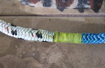 Two different ropes spliced together into one continuous line, a visual metaphor for combining two independent cryptographic secrets into one hybrid key