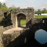 Fyxer’s OpenAI Case Study Turns a Decade of Assistant Work Into an AI Moat Leeds Castle's medieval moat, portcullis gate, and stone bridge reflected in the water