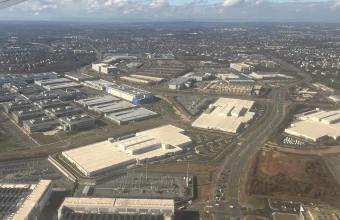 Aerial photo of data center warehouses interspersed with roads and suburban development in Loudoun County, Virginia's Data Center Alley