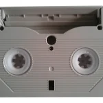 Ahsay Says Version 10.3.4 Fixes Two Exploited AhsayCBS Flaws, and Huntress Says It Does Not Back of an Exabyte Mammoth data cartridge, a tape cassette made for computer backups, shown on a white background