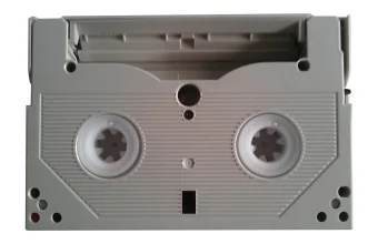 Back of an Exabyte Mammoth data cartridge, a tape cassette made for computer backups, shown on a white background