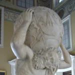 Marble statue of the Titan Atlas straining beneath the carved celestial sphere on his shoulders, the figure Atlassian is named after
