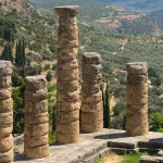 Honeypots Recorded Probes Against Oracle E-Business Suite CVE-2026-101767 Seven Days After Its Patch, and the Finder’s Write-Up Is Dated Patch Day Six weathered stone columns of the Temple of Apollo at Delphi, Greece, standing on a stone platform above a valley of olive groves