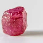 CISA Adds a CVSS 10 GitLab Flaw to Its Exploited List, and Alpine Linux Found That Upgrading GitLab Does Not Fix It Without a Patched Ruby A raw, uncut ruby crystal with a glossy pink-red surface on a plain white background
