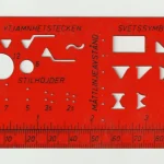 Red 1970s drafting stencil with cut-out symbols and a ruler edge, standing in for a prompt template