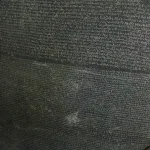 How to Prepare Your Python Code for the Python 3.15 UTF-8 Default and Fix Windows Encoding Bugs Close-up of the Rosetta Stone showing the Demotic script above and the Greek script below, the same text written in two different scripts