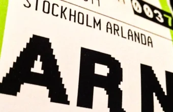 Close-up of an airport baggage tag reading Stockholm Arlanda and ARN