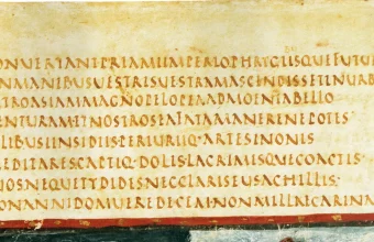 Seven lines of Latin verse in capital letters with no spaces between the words, from a late antique manuscript of Virgil